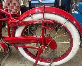 Left side view of chain guard and rear fender.
